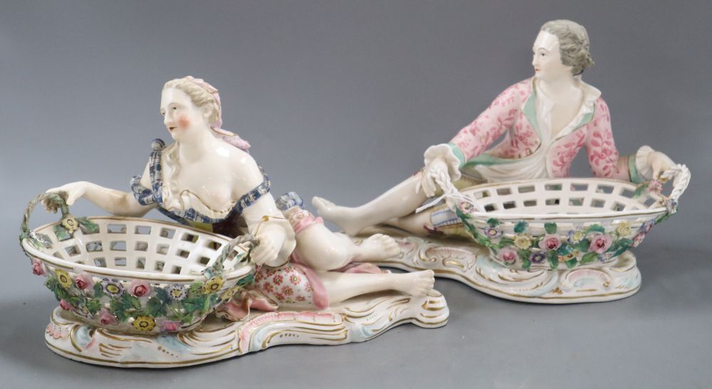 A pair of John Bevington figural centrepieces with baskets, height 19cm